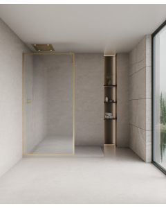 Paroi douche en verre trempé Sécurit transparent délimitée par des profilés doré brossé formant un cadre posée sur un receveur de douche plat
