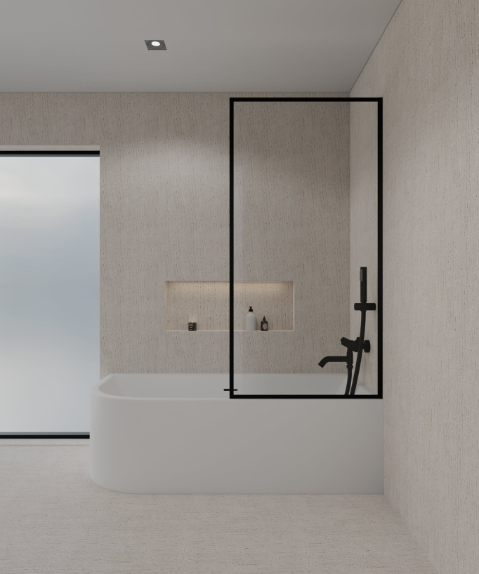 Pare baignoire posée sur une baignoire blanche en verre trempé securit transparent avec cadre en acier inoxydable noir assorti à la robinetterie de bain noire