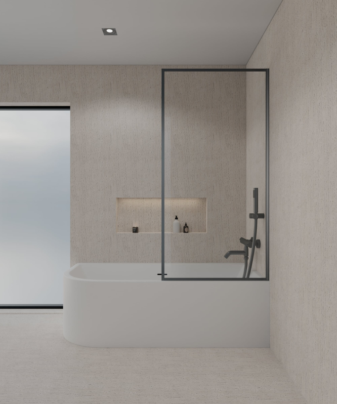 Paroi posée sur une baignoire blanche en verre trempé securit transparent avec cadre en acier inoxydable gun metal assorti à la robinetterie de bain  de même finition