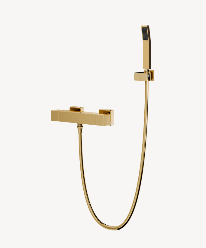 Robinet thermostatique de bain doré, doté d'une douchette à main et support mural et flexible anti-torsion. 